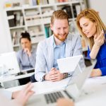 group-of-business-people-working-as-team-in-office-TRCKLYU.jpg